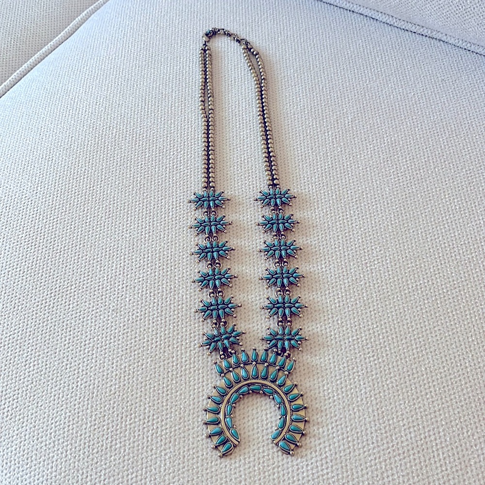 Beautiful turquoise Squash blossom necklace.